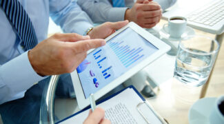 close up executive pointing graph